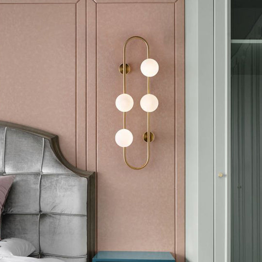 Modern Gold Oblong Sconce Wall Light With 4-Metal Heads And Milky Glass Shade