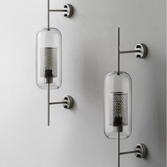 Modern Clear Glass Pill Capsule Wall Sconce With Mesh Screen - 1-Bulb Bathroom Lighting Fixture