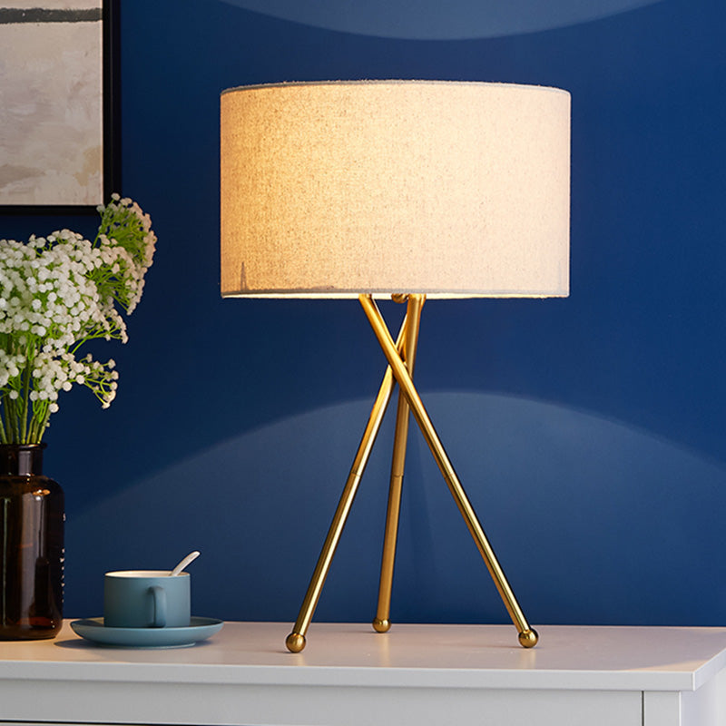 Drum Shaped Table Lamp With Metallic Tripod: Artistic Nightstand Light