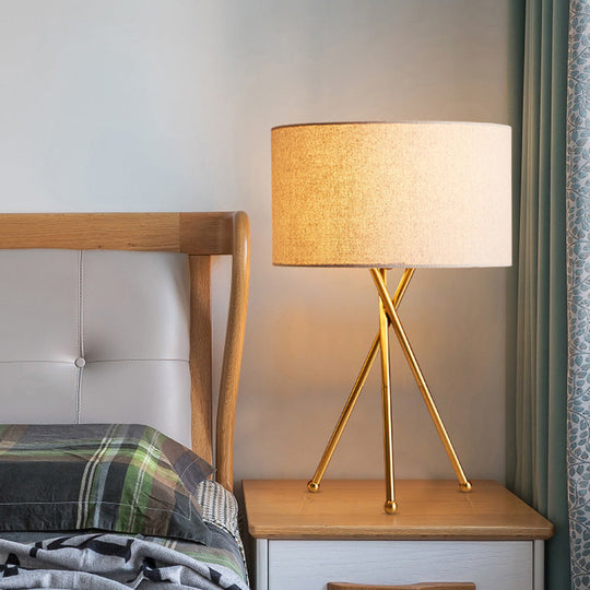 Drum Shaped Table Lamp With Metallic Tripod: Artistic Nightstand Light