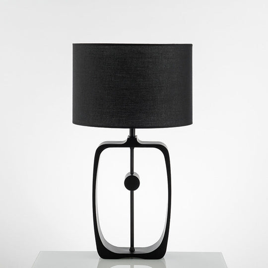 Minimalist Black Fabric Table Lamp With Round Shape And Open Base