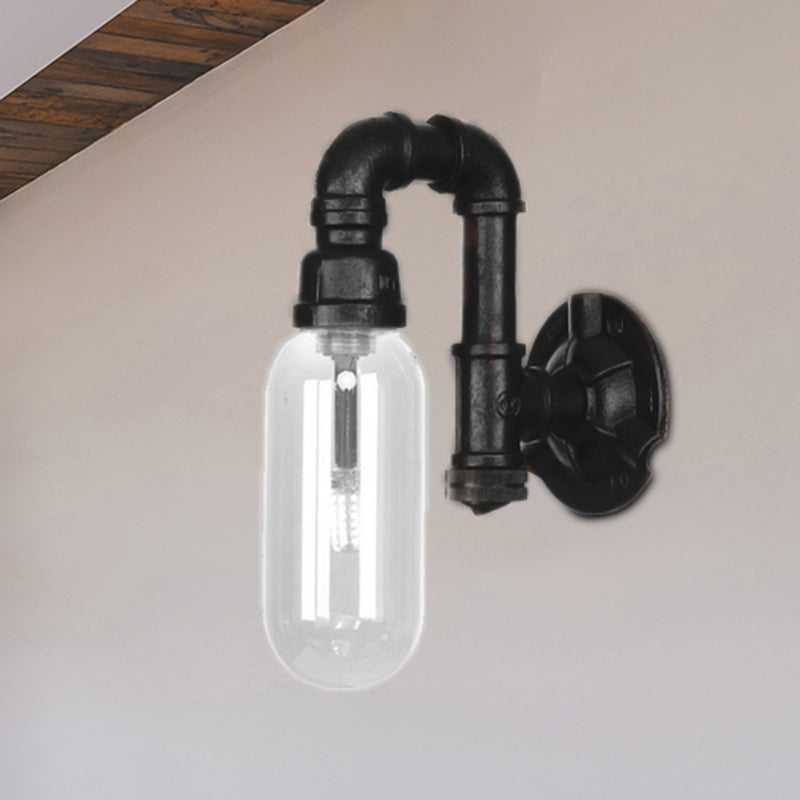 Single Bulb Industrial Wall Sconce With Clear Glass Shade And Black Pipe Mount