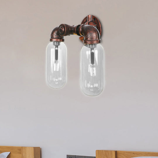 Weathered Copper 2-Light Industrial Sconce With Clear Glass Oval Shade - Wall Lighting Fixture / A