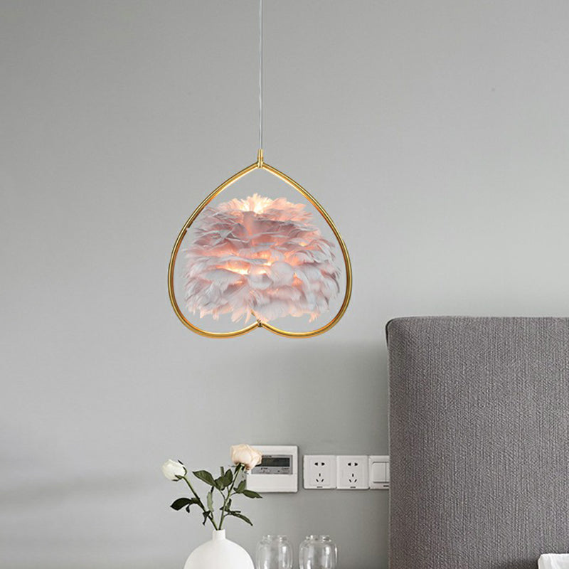 Contemporary Gold Pendant Ceiling Light with Metallic Heart Suspension and Feather Decoration