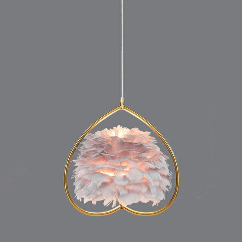 Contemporary Gold Pendant Light With Metallic Heart Suspension And Decorative Feather