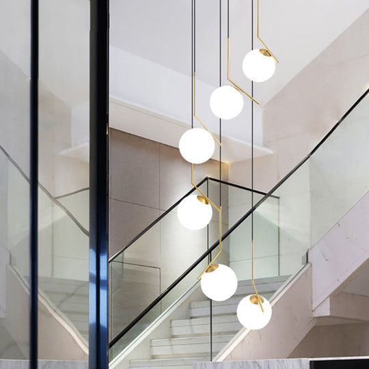 Opal Glass Multi-Light Pendant in Gold for Stylish Staircase Lighting