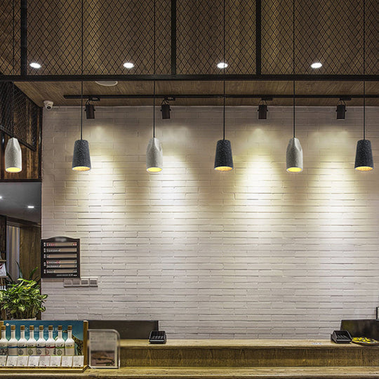 Sleek Single Pendant Light With Geometric Design Cement Finish For Modern Restaurant Ceilings