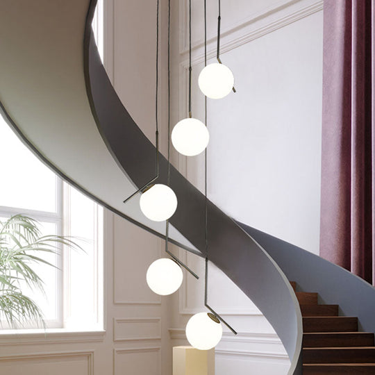 Sleek Opal Glass Globe Spiral Stairwell Pendant Light