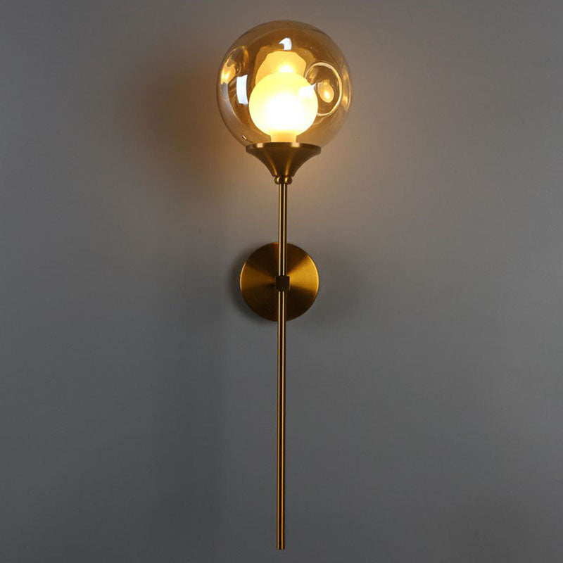 Nordic Glass Wall Light: Ball Shaped Sconce With Brass Pencil Arm Amber