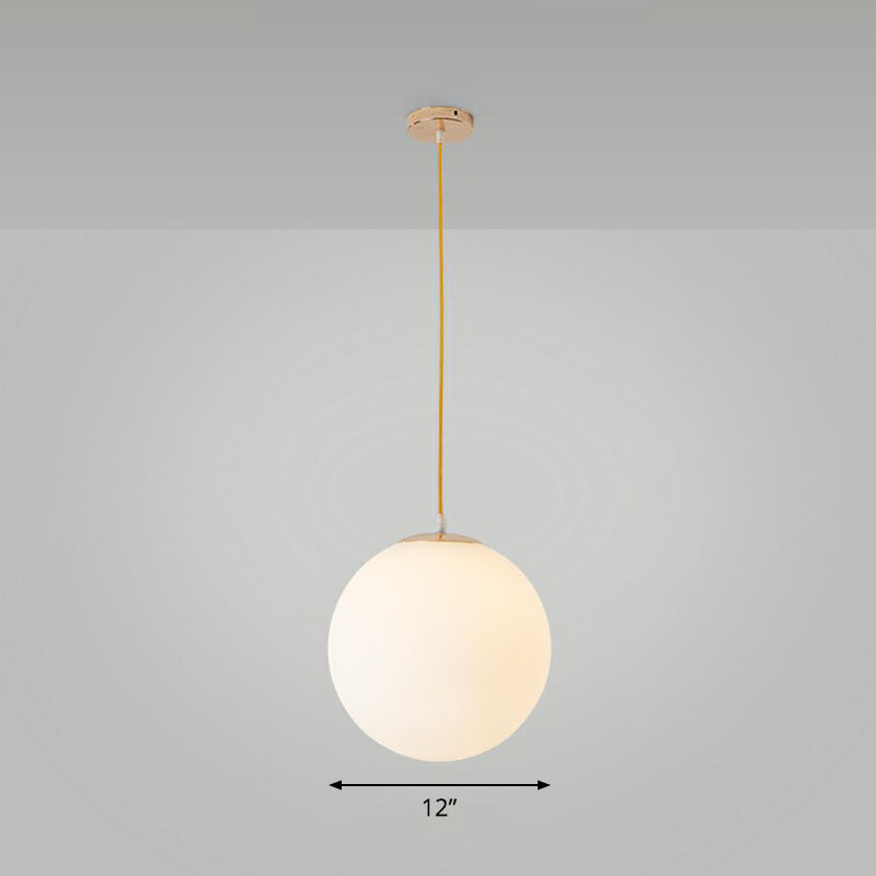 Sleek White Glass Pendant Light for Minimalist Table Settings