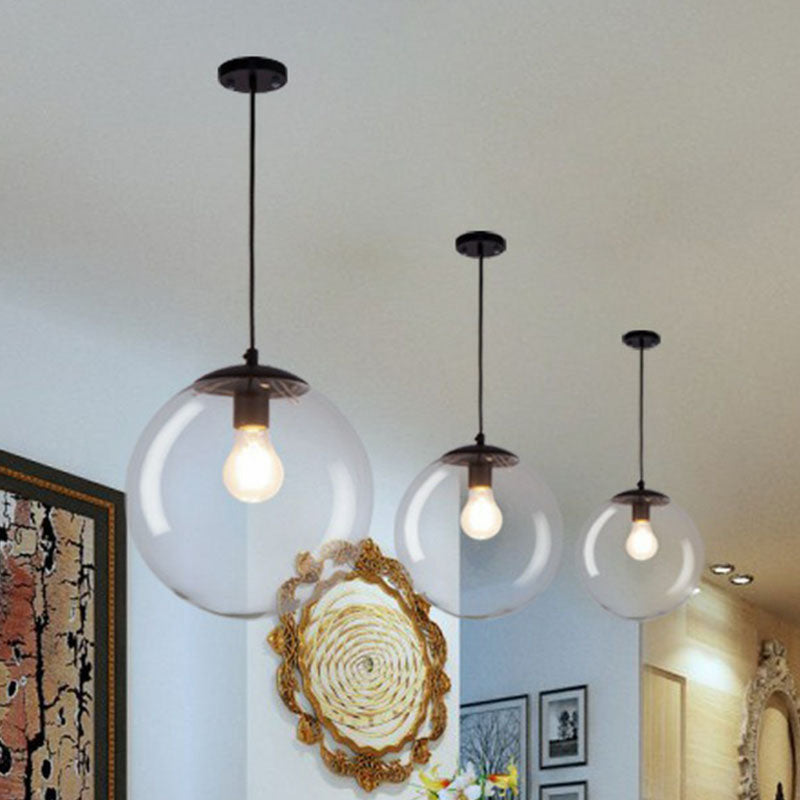 Sleek Clear Glass Pendant Light With A Touch Of Simplicity - Black Spherical Design Suspended
