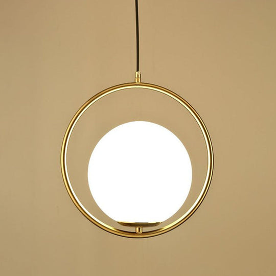 Modern Gold Ring Globe Pendant Ceiling Light With Cream Glass - Bedside Pendulum Design