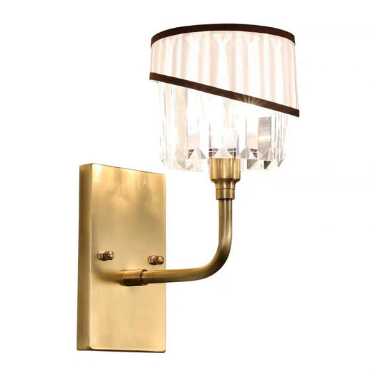 Contemporary Brass Cylinder Sconce With Crystal And Curved Arm Wall Mount Light
