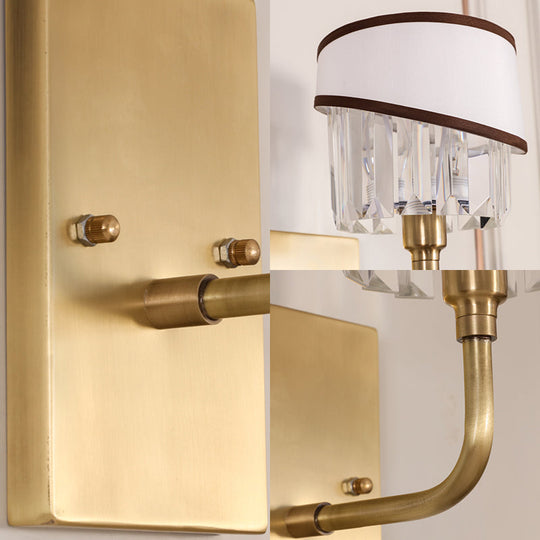 Contemporary Brass Cylinder Sconce With Crystal And Curved Arm Wall Mount Light
