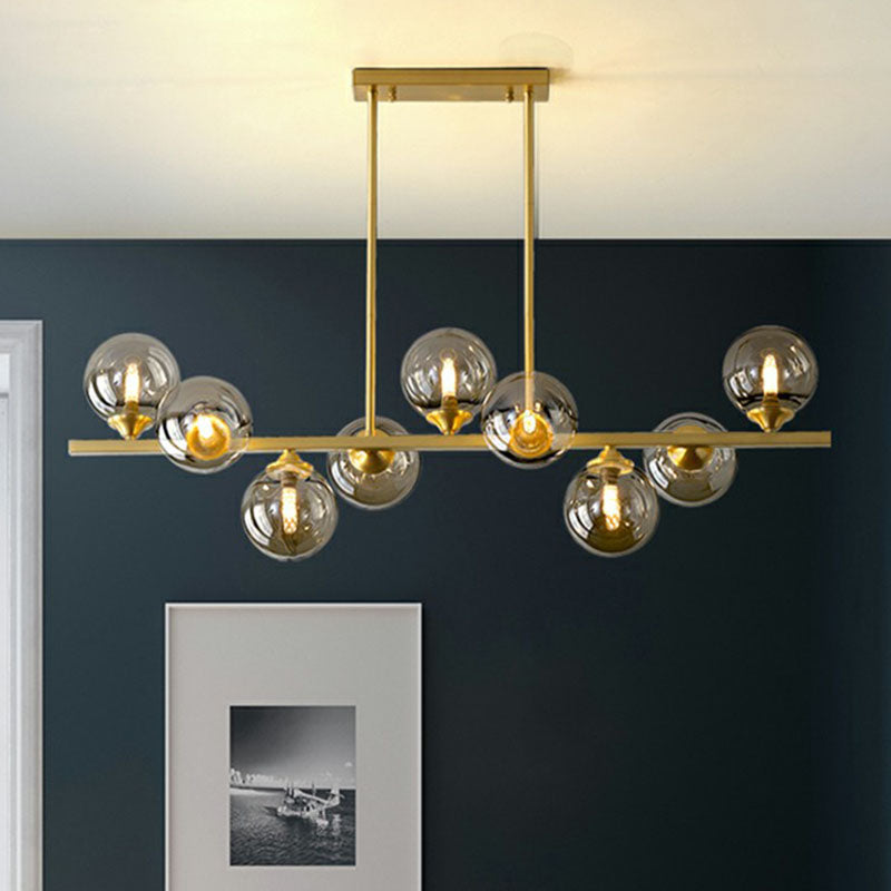Postmodern Gold Finish Amber Glass Ball Island Hanging Lamp For Table Illumination