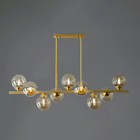 Postmodern Gold Finish Amber Glass Ball Island Hanging Lamp For Table Illumination