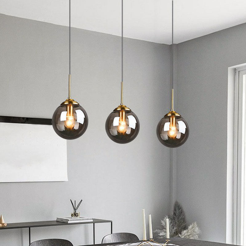 Sleek Glass 3-Bulb Spherical Ceiling Light Fixture In Brass For Minimalistic Dining Rooms Smoke Gray