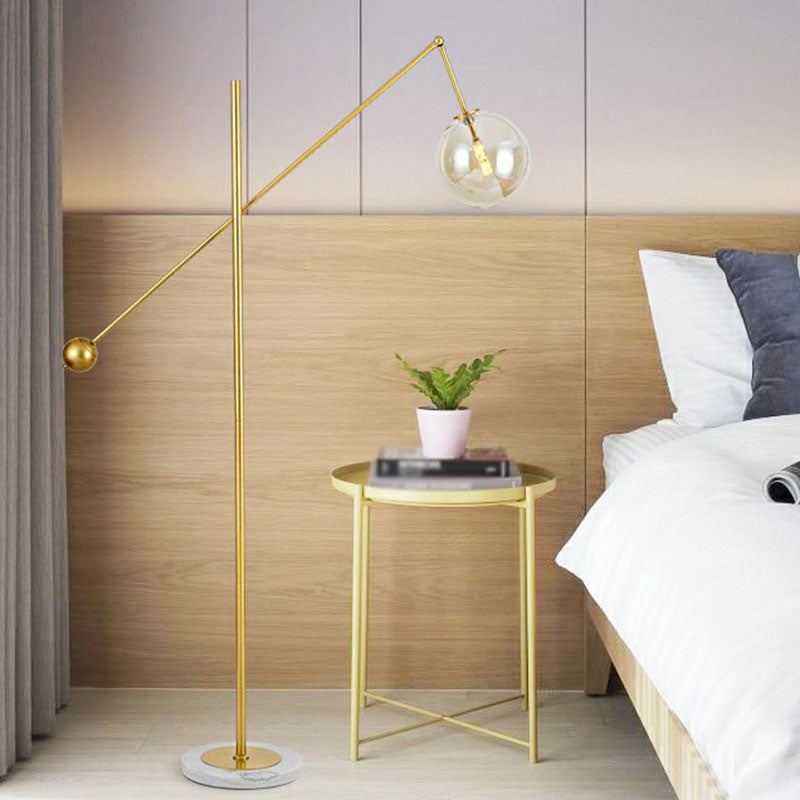 Postmodern Brass Plated Balance Arm Floor Lamp With Glass Spherical Shade - Stylish Metal Stand-Up