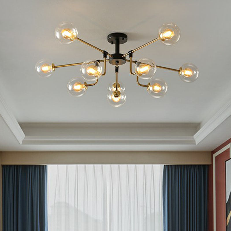 10-Light Black and Brass Chandelier with Radial Pendant and Ball Glass Shade: A Postmodern Statement