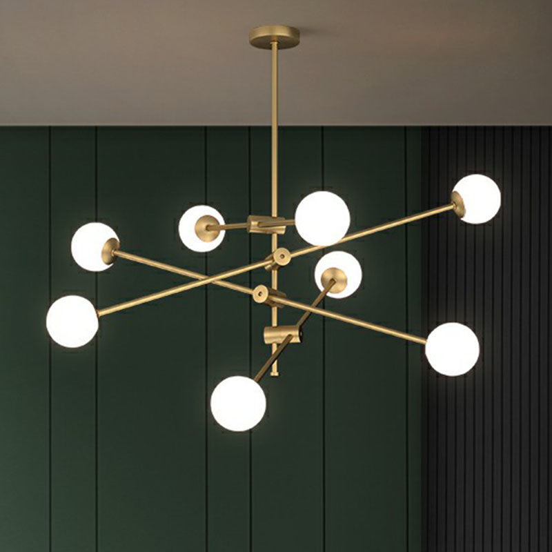 Minimalist Brass Finish Chandelier With Swivel Arm And Glass Shade