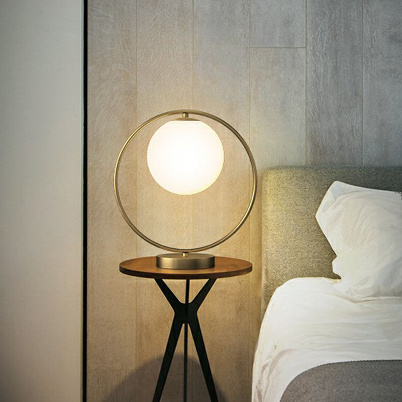 White Glass Ball Bedside Lamp With Gold Ring Decor - Single Minimalistic Table Light