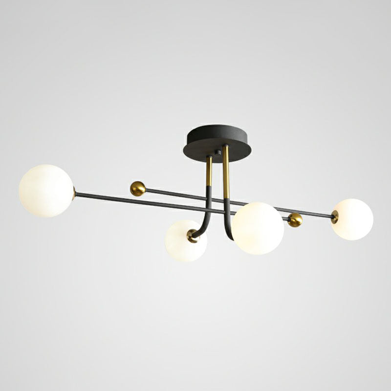 Sleek Cream Glass Ball Semi Mount Ceiling Light With Minimalistic Black And Brass Accents For Dining