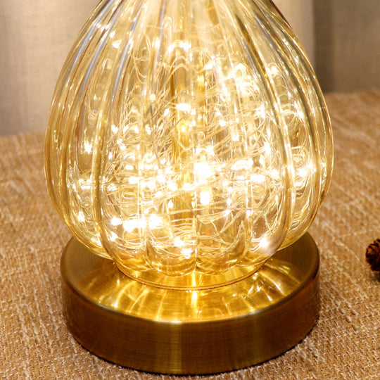 Modern Amber Glass Droplet Night Light With White Table Lamp And Feather Shade