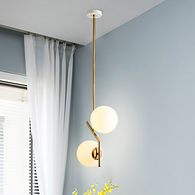 Contemporary Gold Linear Chandelier With 2 White Glass Sphere Lights - Metal Hanging Fixture