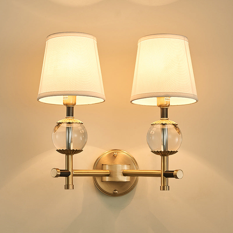 Traditional White Fabric Wall Sconce With Gold Conical Mount Crystal Ball Accent - 1/2 Heads Entry