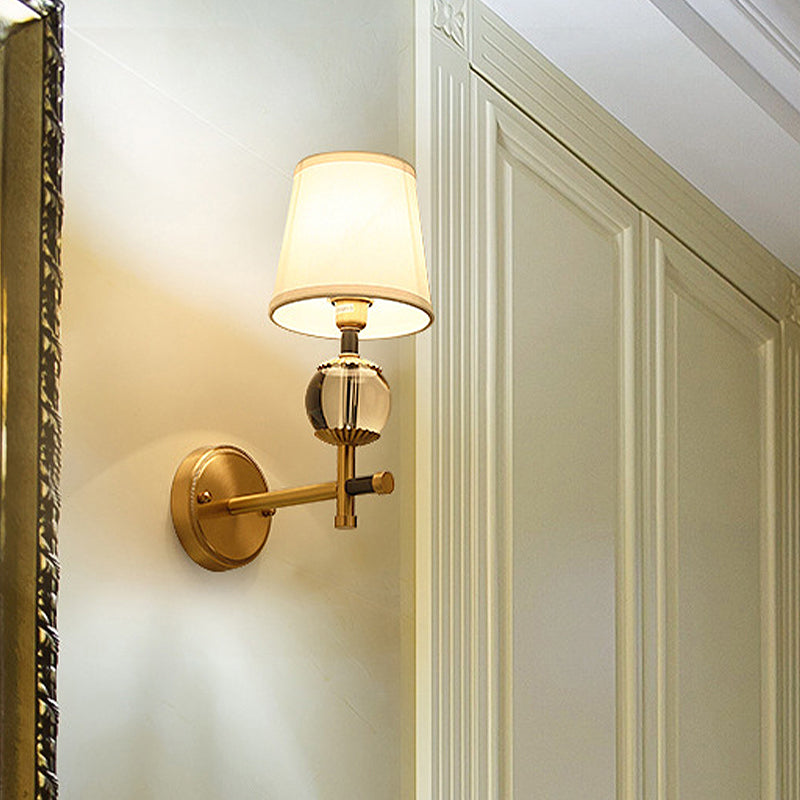 Traditional White Fabric Wall Sconce With Gold Conical Mount Crystal Ball Accent - 1/2 Heads Entry