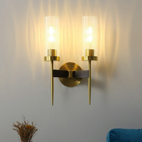 Modern Glass Tube Wall Sconce with Prismatic Design & Brass Finish for