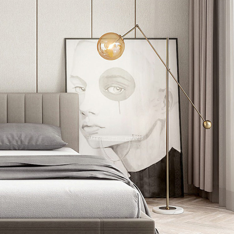 Simplicity 1-Light Bronze Amber Glass Sphere Floor Lamp With Balance Arm