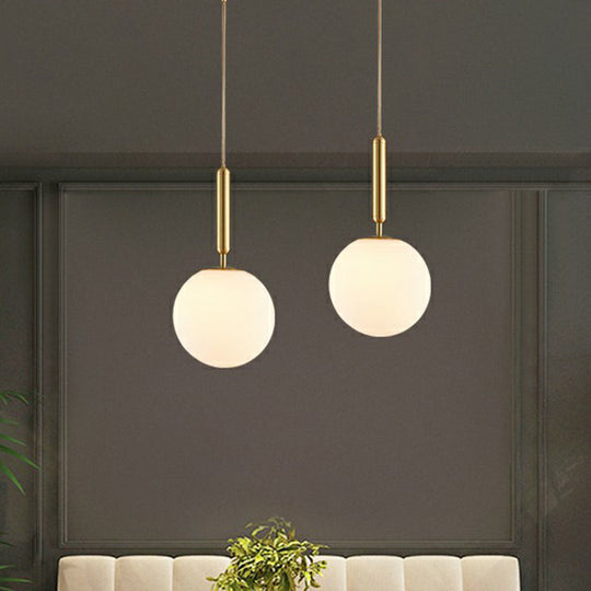 Brass Pendulum Pendant Light With White Glass Shade For Dining Room
