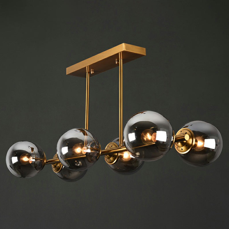Postmodern Brass Island Light With Globe Glass Shade: Stylish Metal Ceiling Fixture