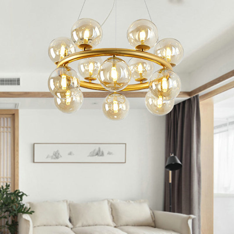 Modern 12-Bulb Gold Chandelier With Clear Glass Shade - Stylish Globe Suspension Light