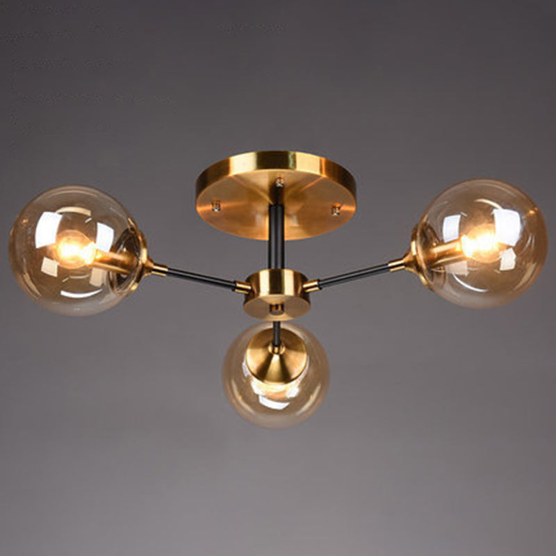 Postmodern Brass Finish Radial Ceiling Lamp With Glass Ball Shade 3 / Amber