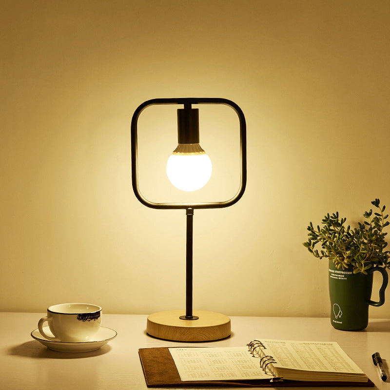 Geometric Frame Metal Table Lamp With Round Wooden Base - Stylish Industrial Bedside Night Light