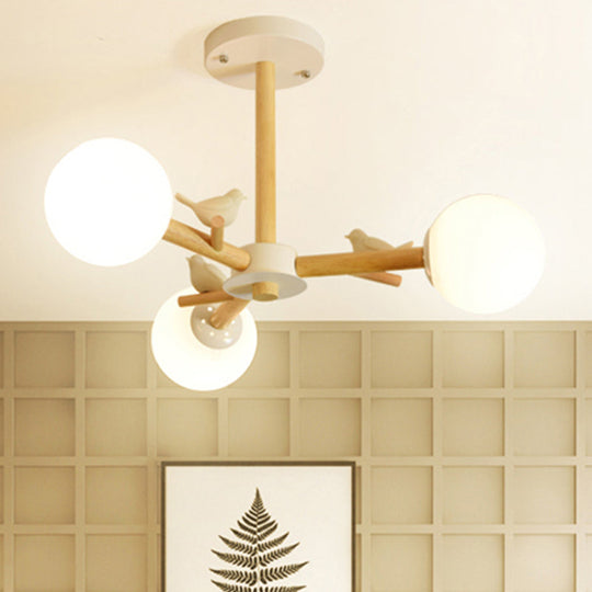 Japanese-Inspired Bedroom Chandelier with Orb Shade, Birds, Wood, and Glass in White