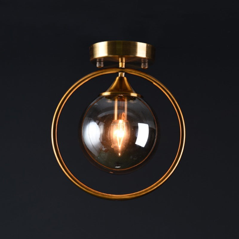 Postmodern Glass Ball Ceiling Light With Brass Metal Ring - 1-Light Semi-Flush Mount For Corridors