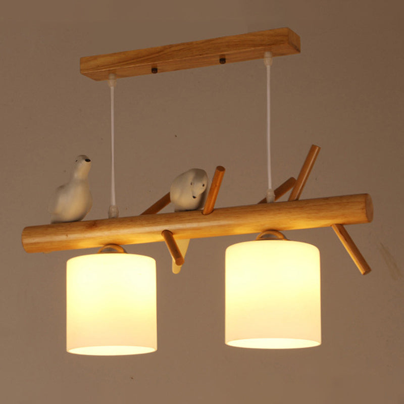 Nordic Wood Pendant Light With Opal Glass Cylinder And Resin Bird Decor