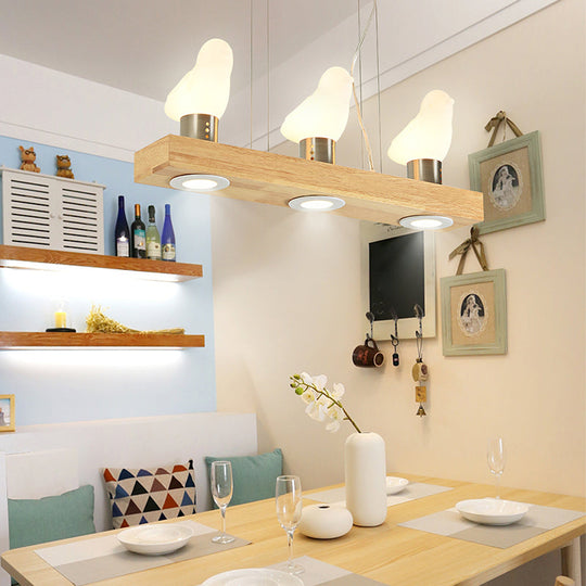 Ivory Glass Bird Island Pendant Lighting Fixture With Decorative Wood Suspended Design