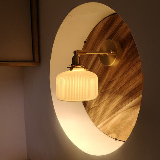 Brass Pivot Joint Foyer Sconce: Round Ribbed Glass Wall Light With White Simplicity (1 Bulb)