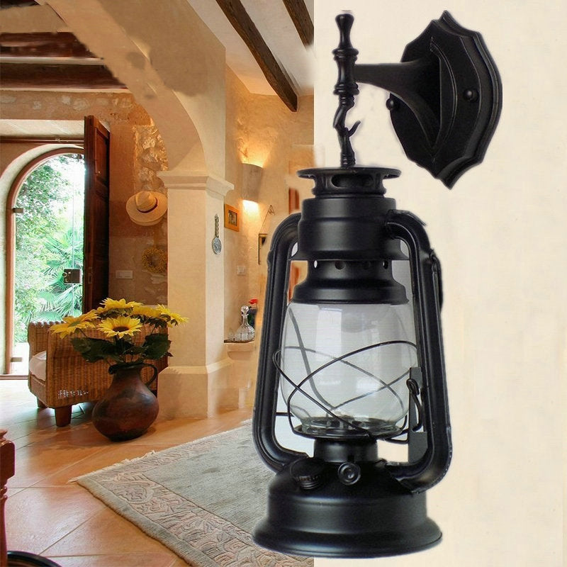 Antique Style Single-Bulb Oil Lantern Sconce: Clear Glass Wall Mount Light For Aisles Black /