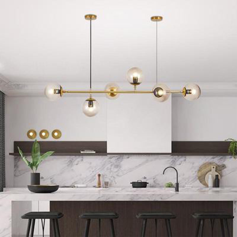 Postmodern Gold Finish Dining Room Island Lighting Pendant With Ball Glass Shade - 6 Bulbs Clear