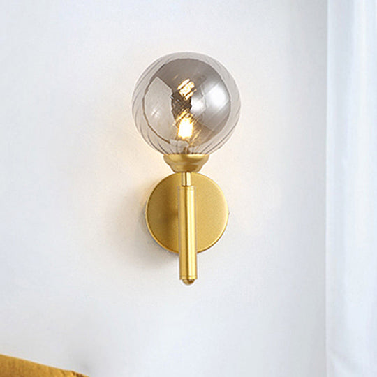 Modern Brass Wall Light With Smoked Textured Glass Globe Bulb