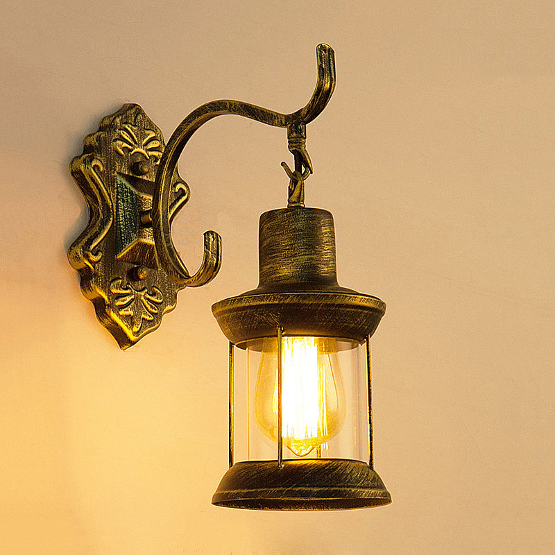 Rustic Wall Mounted Kerosene Light Fixture With Carved Pattern - Aged Bronze Finish Clear Glass