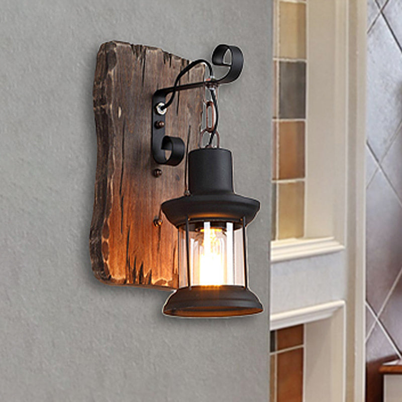 Rustic Clear Glass Caged One-Light Sconce With Wooden Backplate - Black Finish