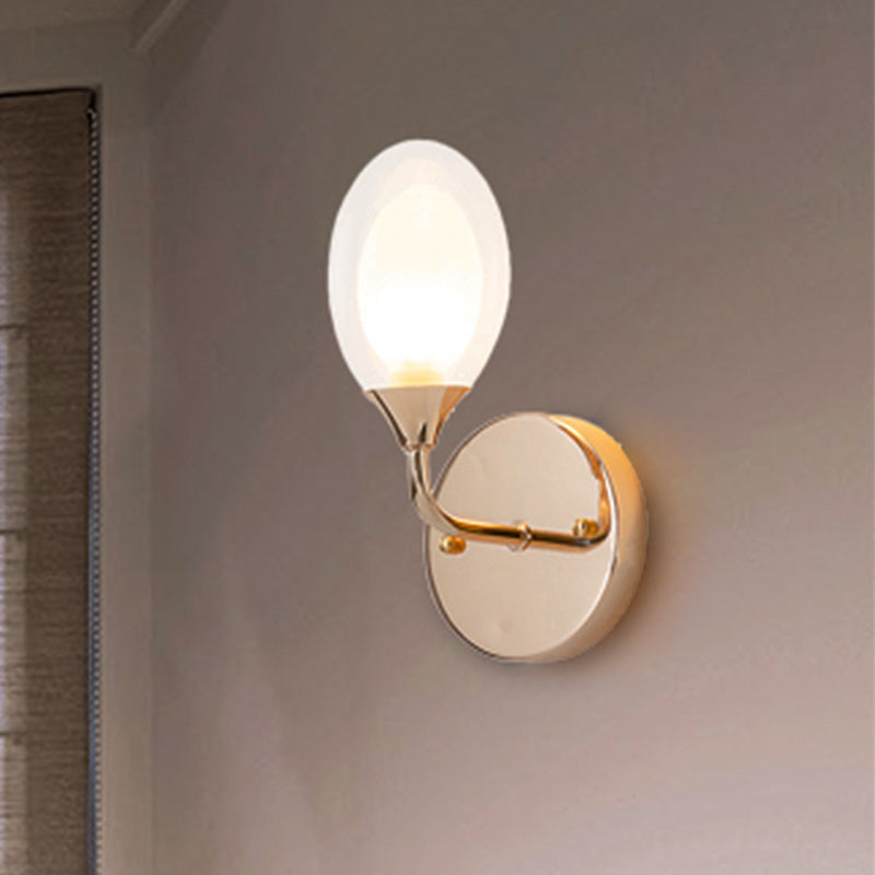 Modern Brass Wall Sconce With Clear Glass Shade - Oval Design For Dining Room