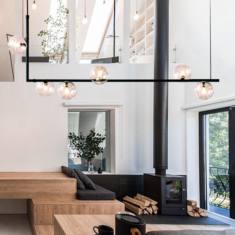 Modern Minimalism Black Linear 6-Light Island Pendant Lighting with Sphere Glass Shade for Living Room.
