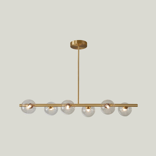 Sleek and Elegant Linear Gold Island Pendant Lighting with Spherical Glass Shades for Dining Table
